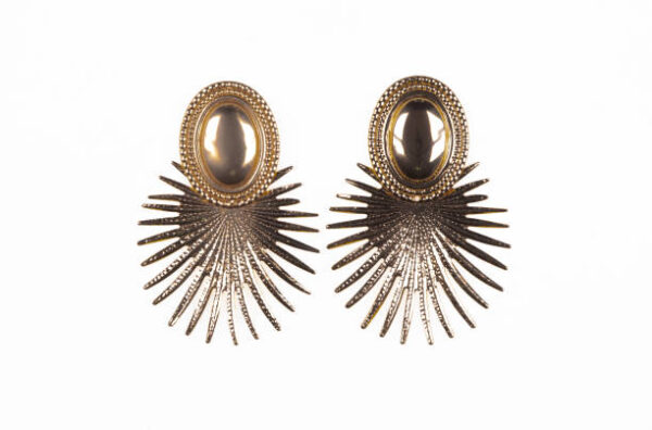 Gold earrings with spikes isolated on white background