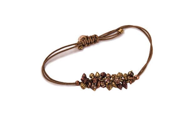 Bracelet with pearls, zirconium and beads isolated over white.